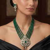 Kundan Pendant and strings of Emerald bead Necklace with Earrings