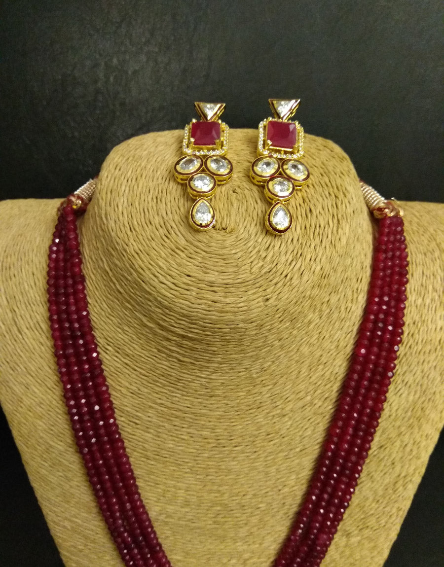 Kundan Pendant and strings of Red bead Necklace with Earrings Set